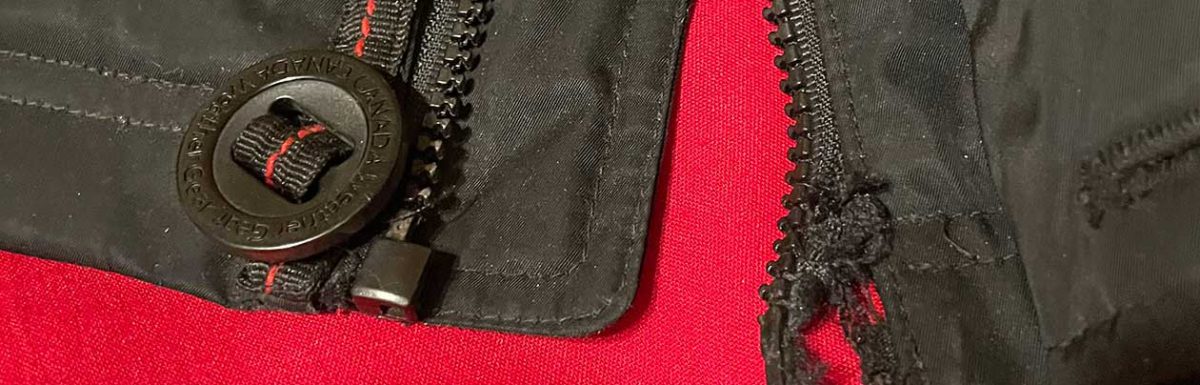 Damaged zipper and starter pin on jacket